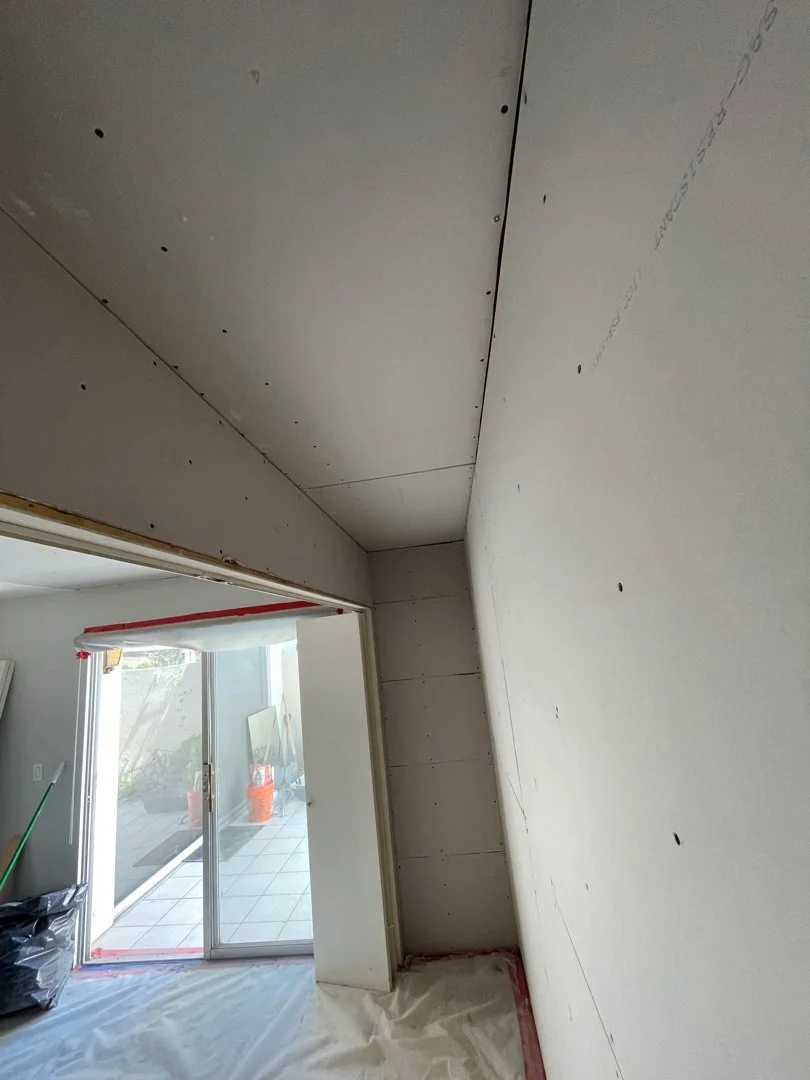 Drywall installation inside closet in San Diego