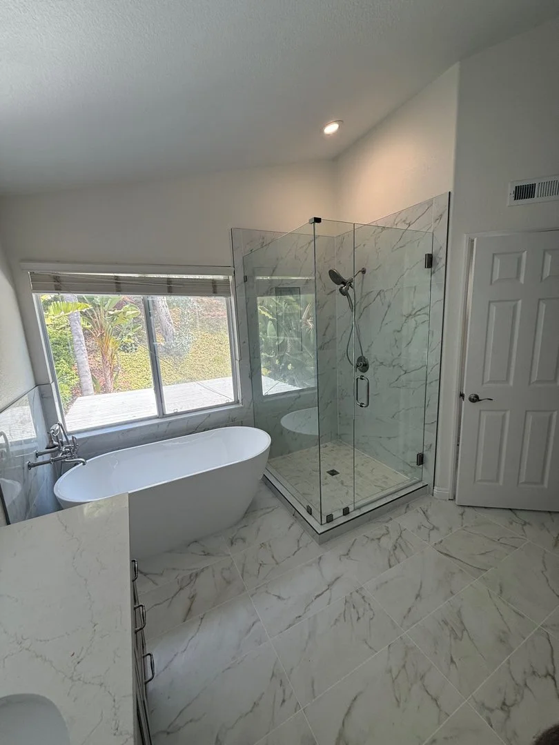 Stand alone tub and new shower doors installed by HUGE Handyman in San Diego