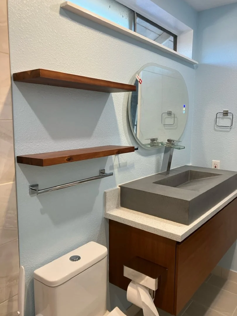 New vanity and floating shelves installed by HUGE Handyman in San Diego