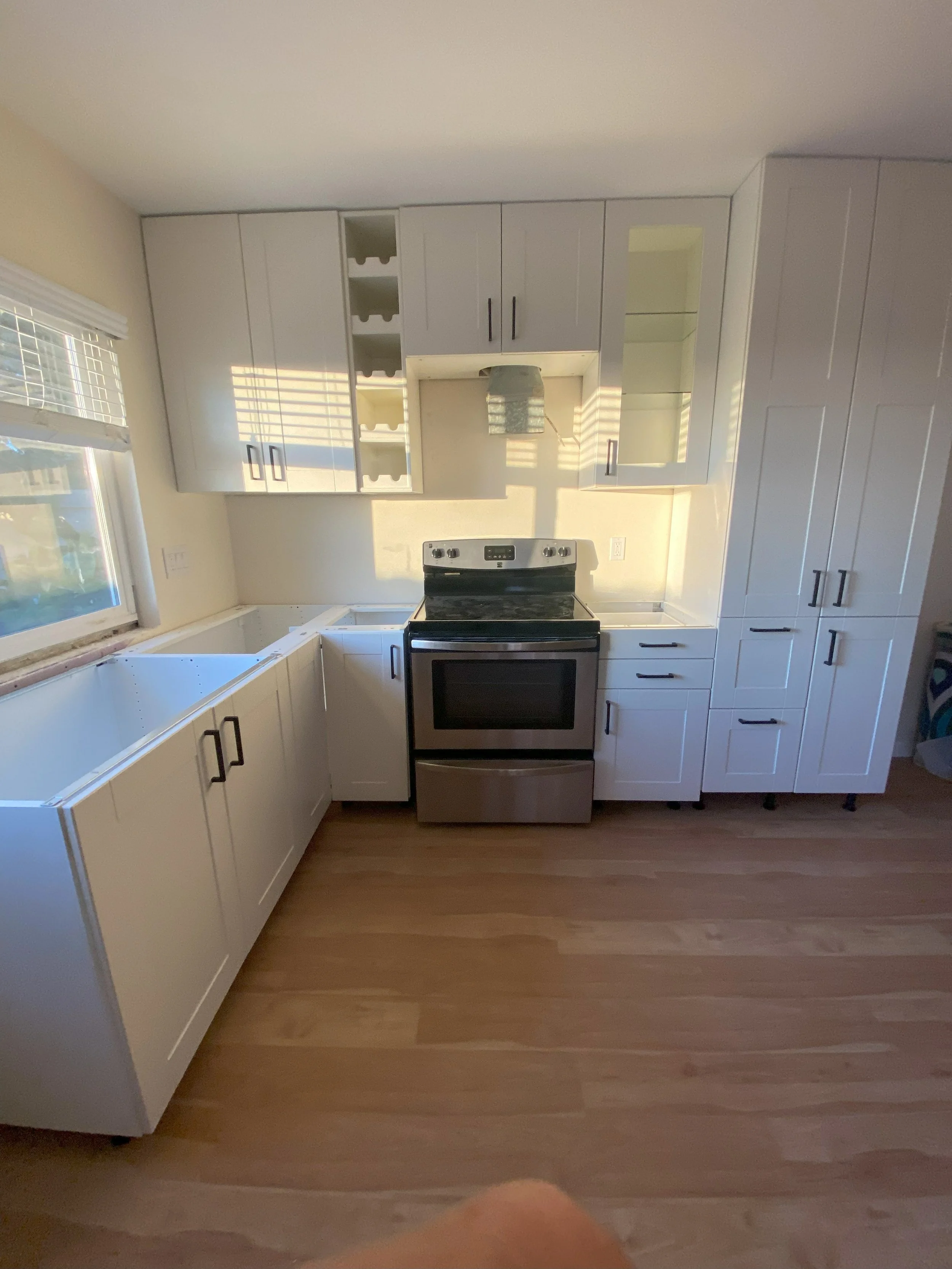 New cabinet laid out and installed by HUGE Handyman in San Diego home