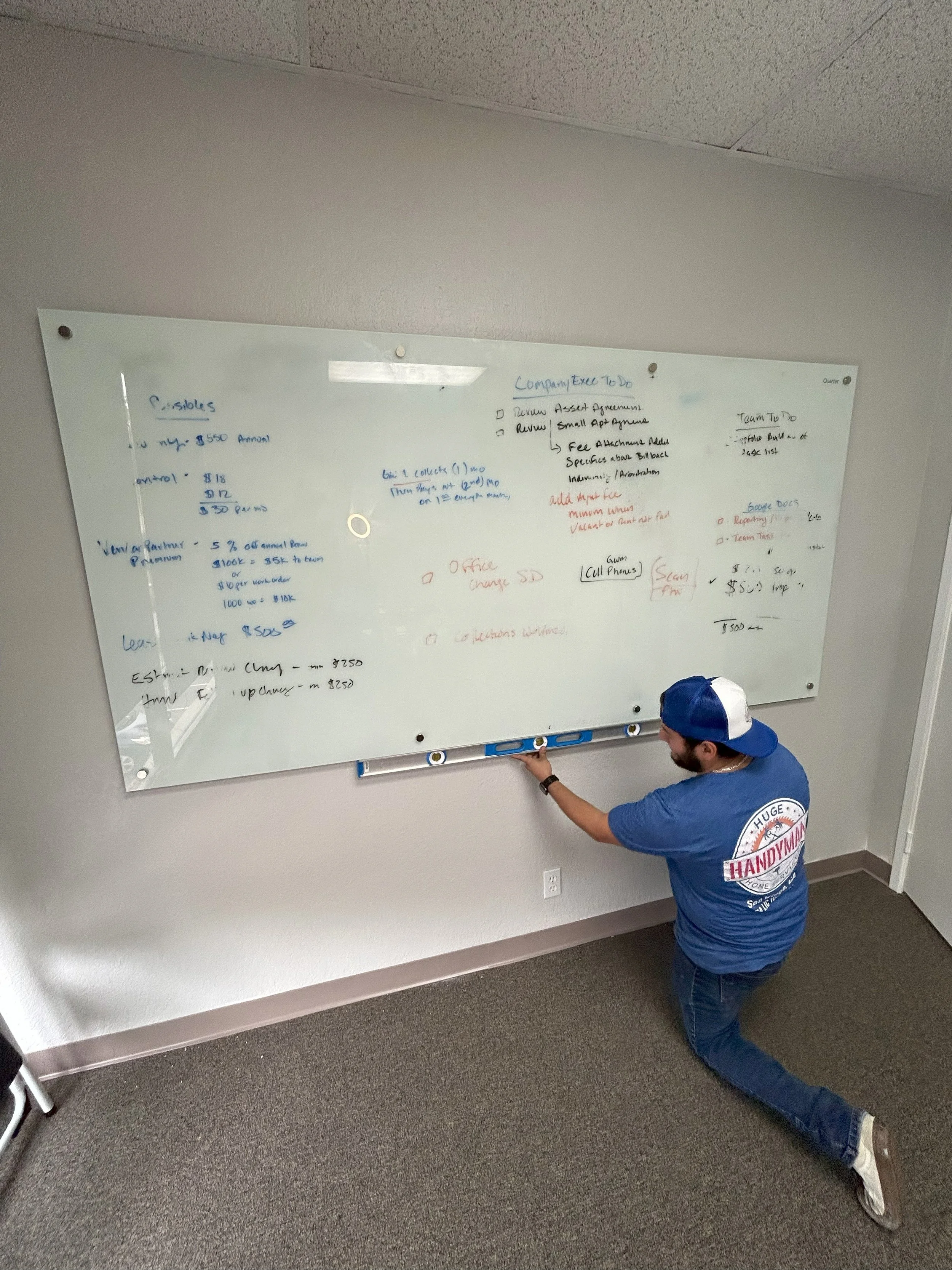 white board professionally hung by HUGE Handyman in San Diego