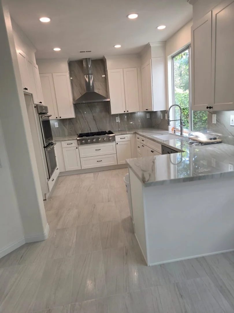 full kitchen remodel with new floor tile, and new cabinets in San Diego
