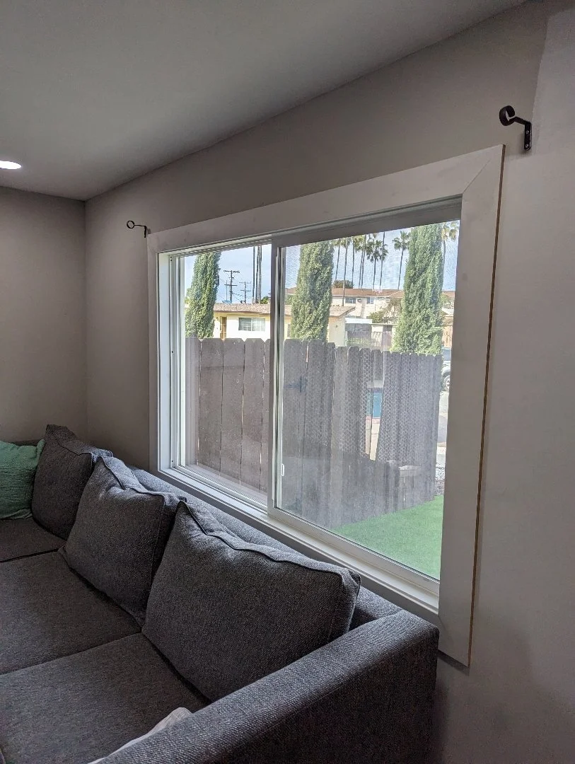 window trim professionally cut, installed and finished by HUGE Handyman in San Diego home