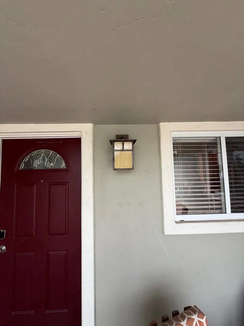 outdoor light sconce replaced by HUGE Handyman in San Diego