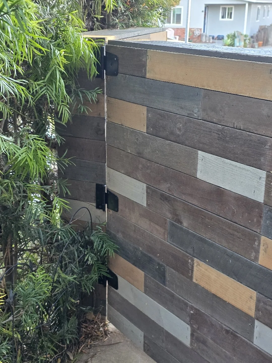 new gate hinges installed by HUGE Handyman in San Diego home