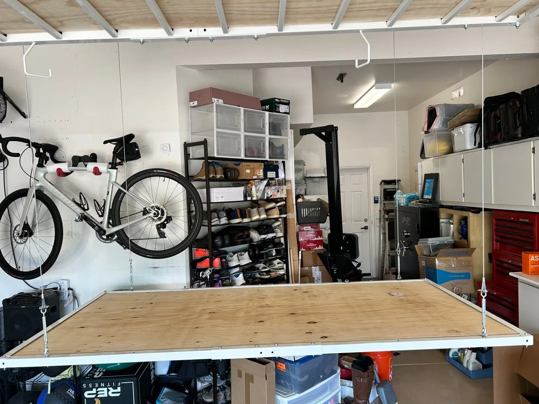 Custom garage storage lift installed by HUGE Handyman in San Diego home