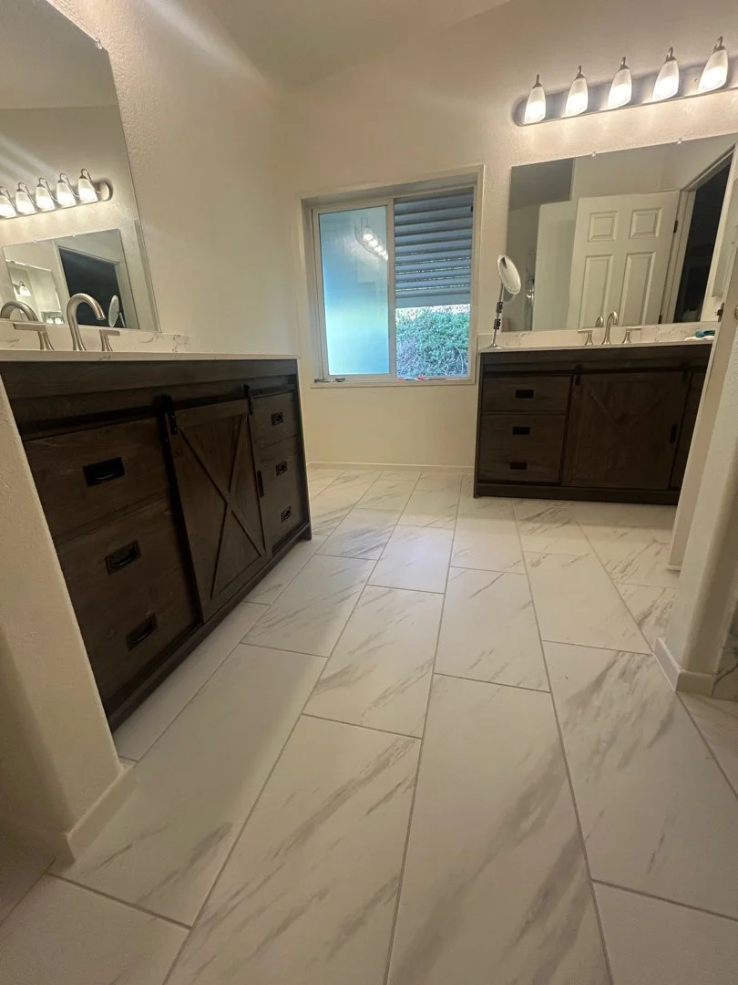New floor tiled and vanity installed by HUGE Handyman
