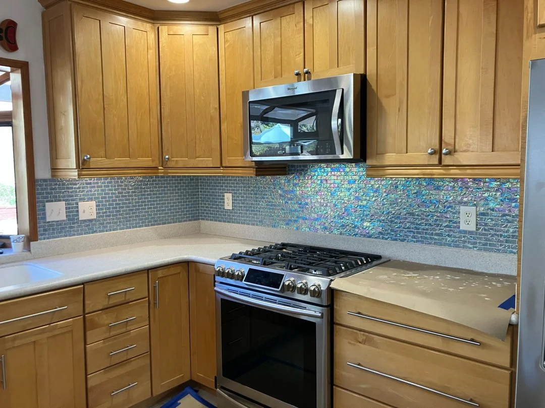 Glass tile backsplash professionally installed by HUGE Handyman in San Diego