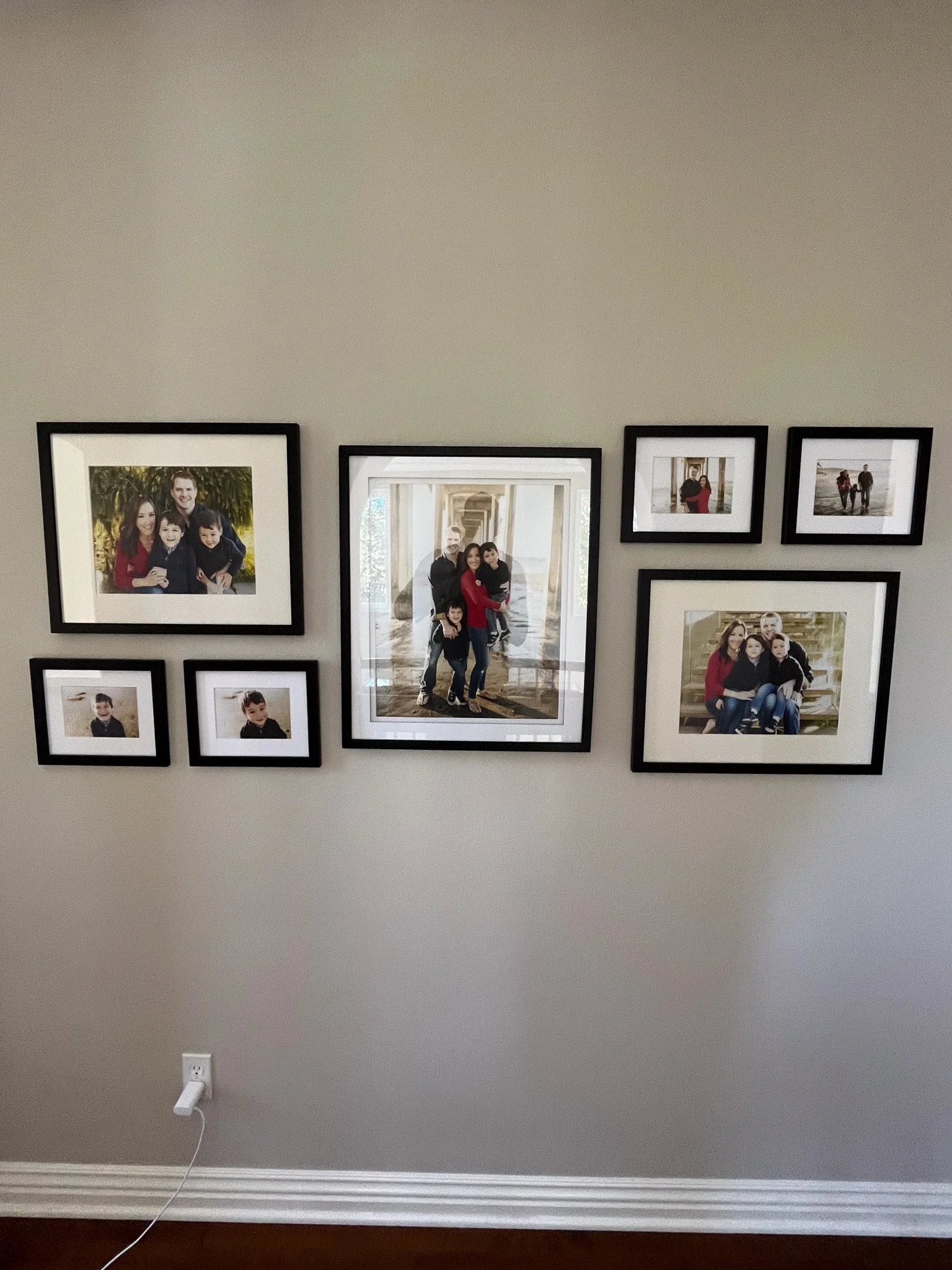 Pictures frames professionally hung by HUGE Handyman in San Diego home