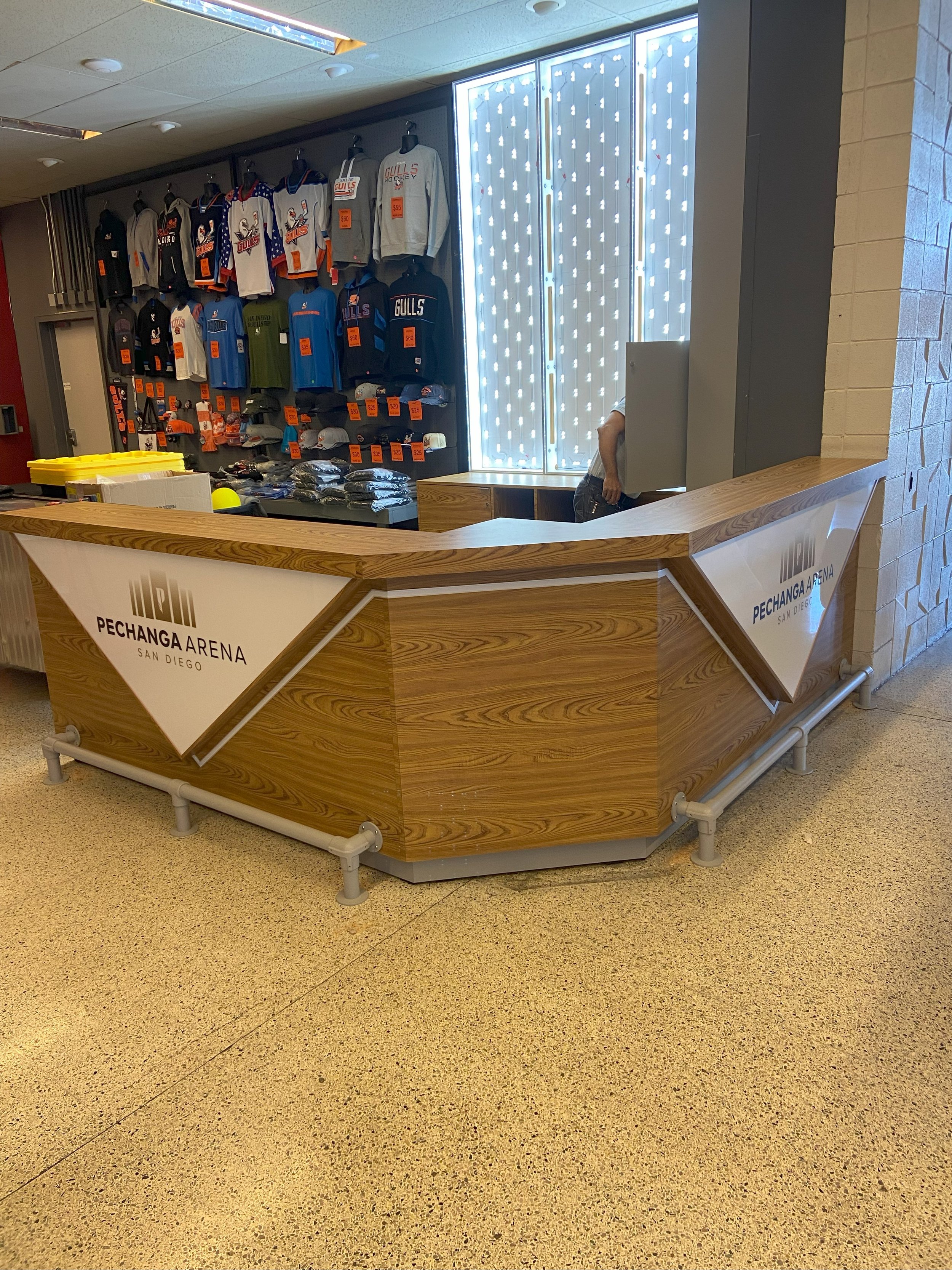 custom cabinetry exhibit assembled by HUGE Handyman in San Diego