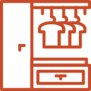 A brown kitchen stove with four burners and a drawer below.