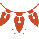 Close-up of a decorative necklace with orange leaf-shaped pendants and a black string.