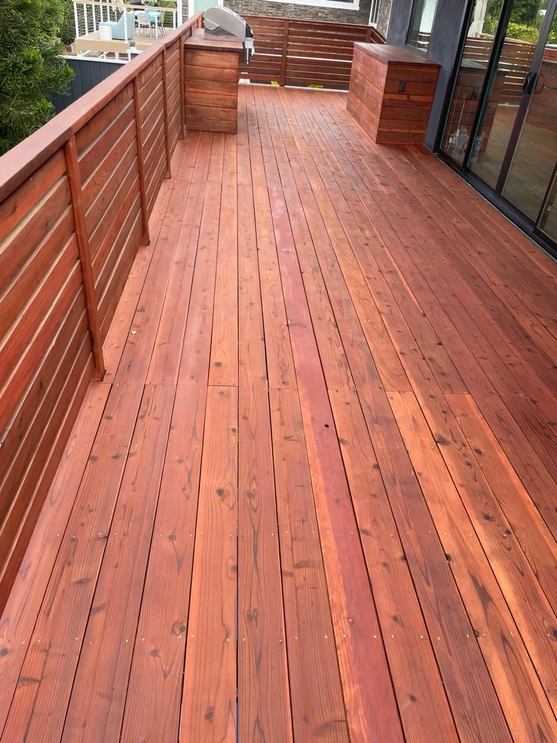 deck board repair and re-stained by HUGE Handyman in San Diego