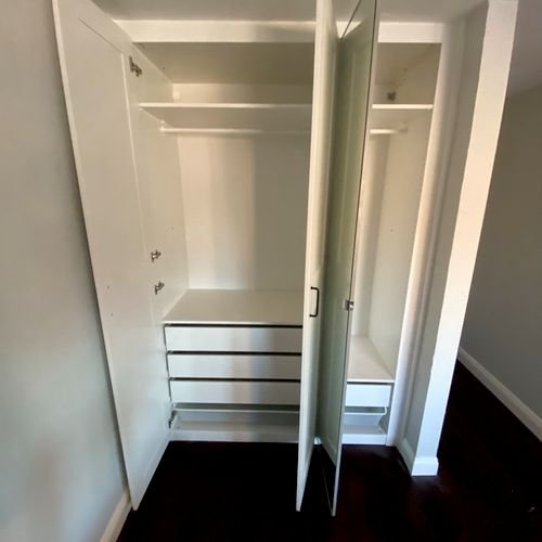 Typical closets with structural headers but owner wanted to utilize the space. Built in the closets and made them fit the space. More cost effective than custom closets at Home Depot!