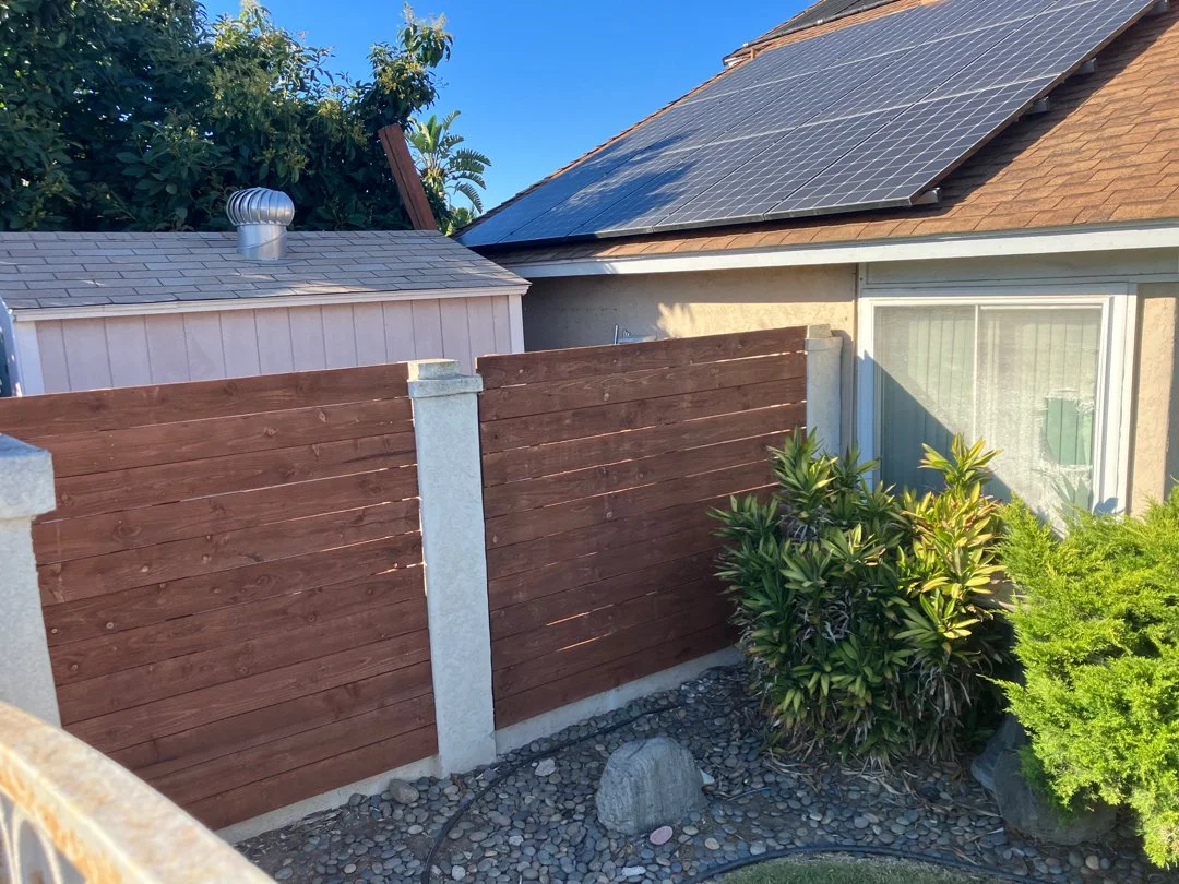 wood board fence professionally installed by HUGE Handyman in San Diego