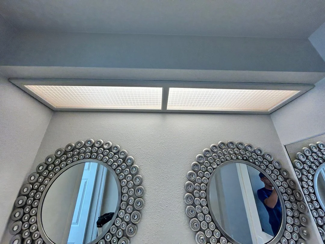 What San Diego homeowners should know before removing an old bathroom mirror
