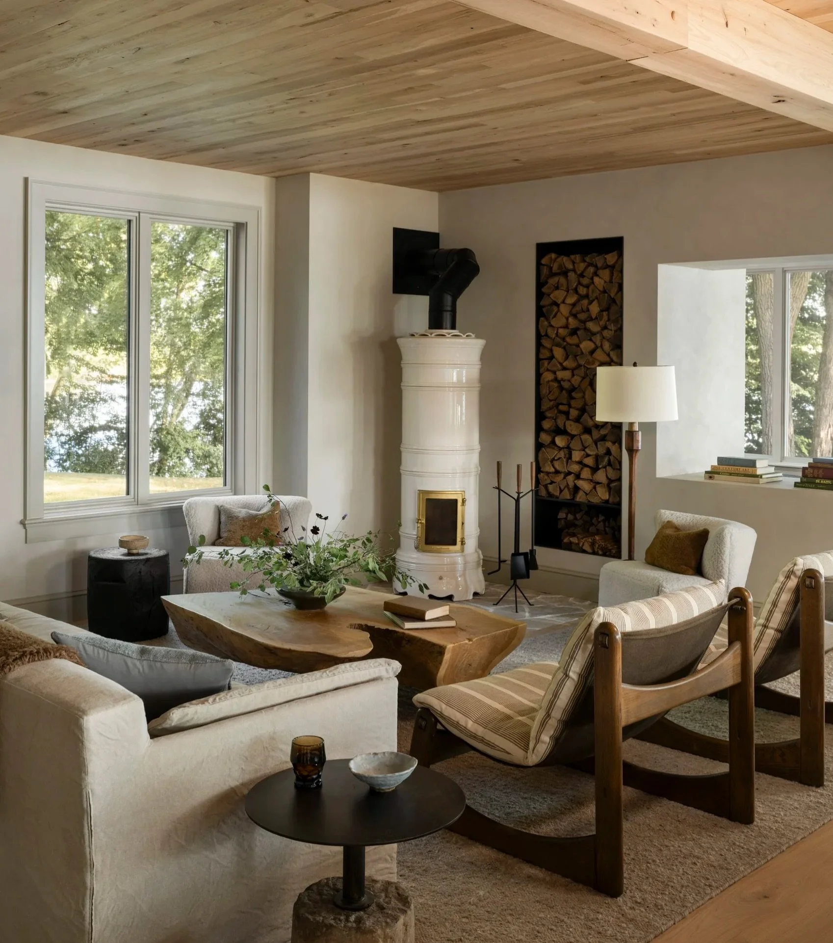 Friday Find. 

No TV, no distractions, just views of the outdoors, a ceramic stove and a really good reason to stay and talk. I love everything about how this room is arranged. It&rsquo;s genuinely designed for people to be together.

Design by my al
