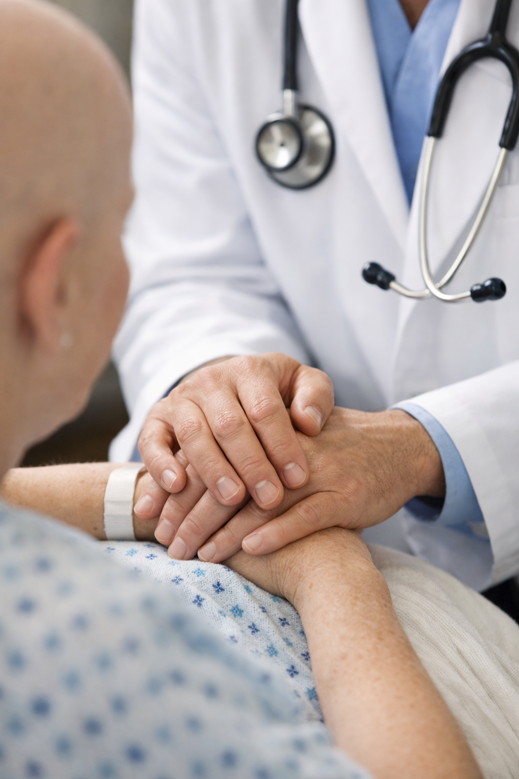 Image of Doctor Holding Patient's Hand