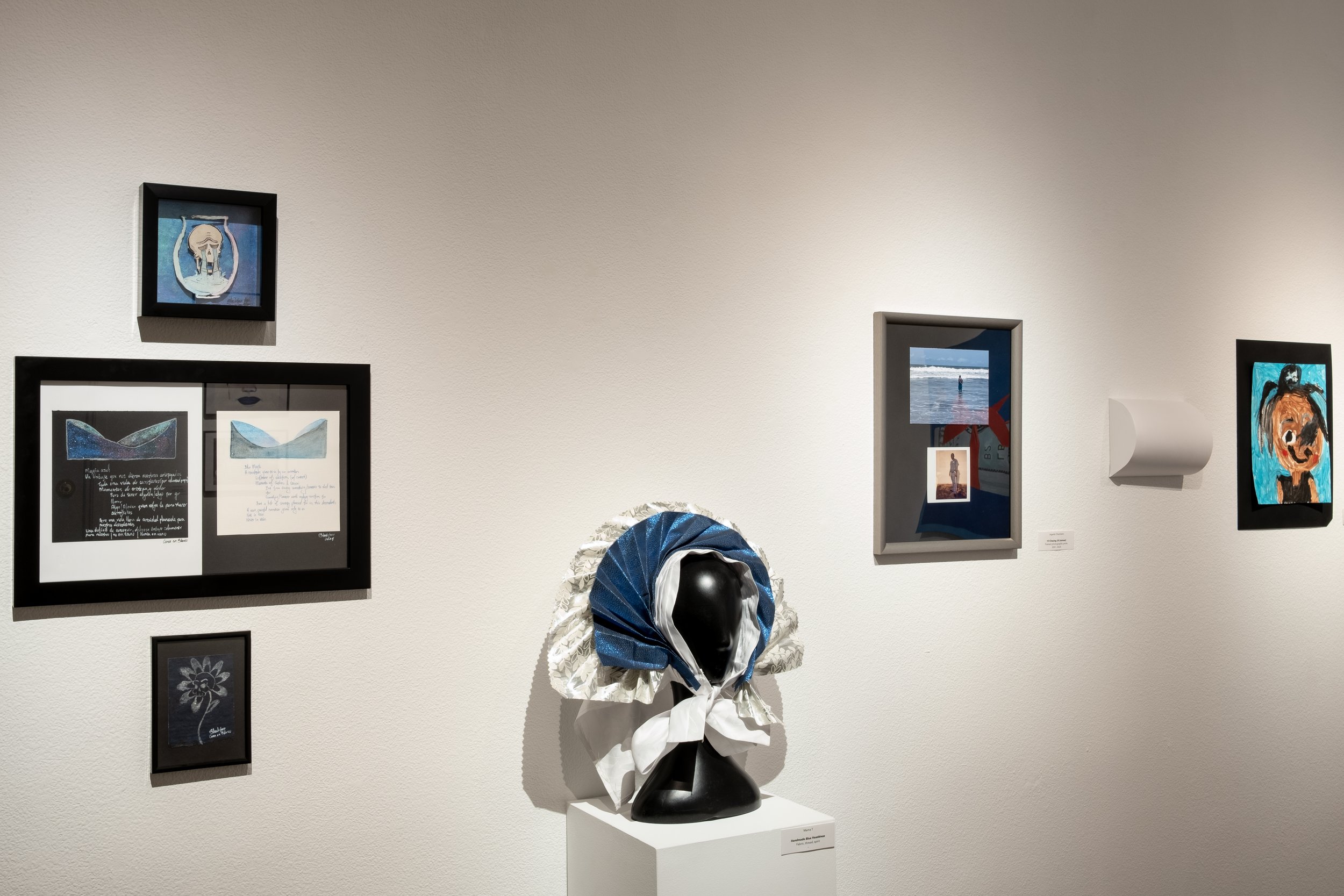 (Middle) "Handmade Blue Headdress", 2023 by Mama T
