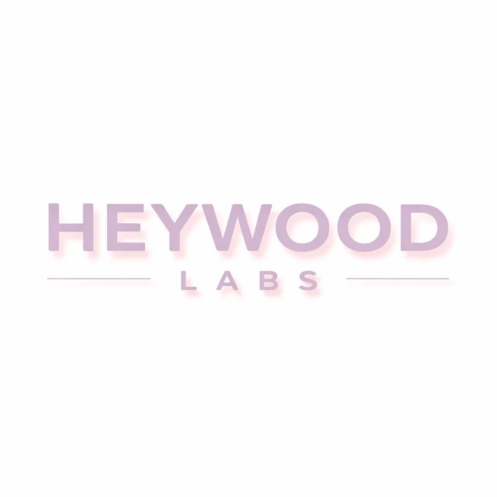 Heywood Labs logo in pastel purple text on a white background.
