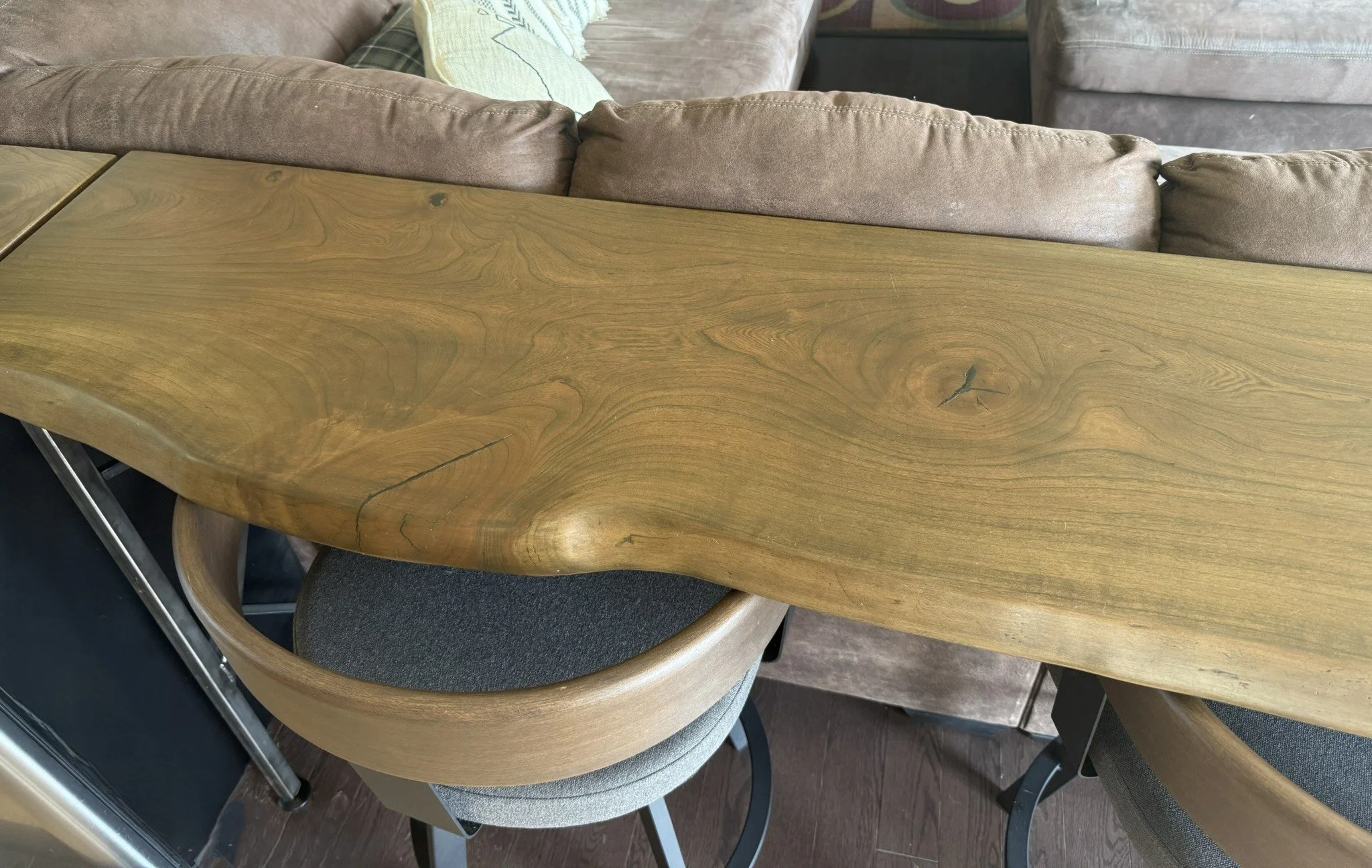 Rustic live edge black cherry console table with custom designed and built steel legs, and matching cutting board