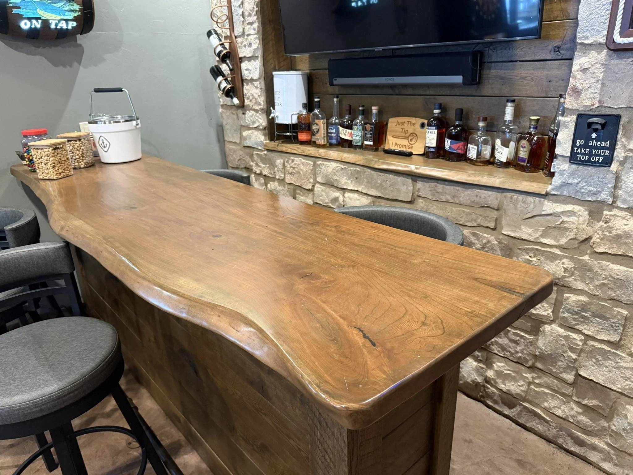 Rustic Black Cherry live edge bar, rustic oak base/cabinets with original saw marks