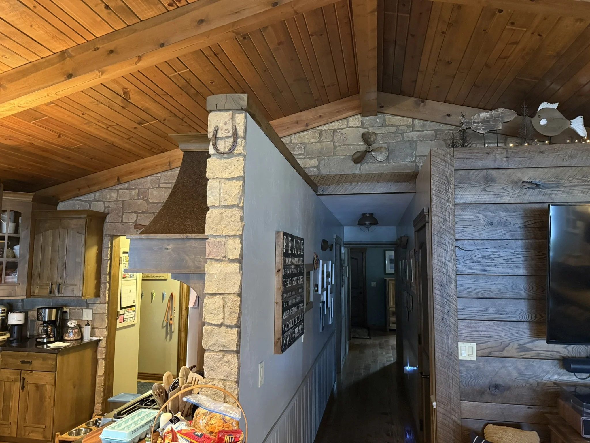 Natural Stone wall cladding, rustic hand-hewn oak wall topper with original saw marks