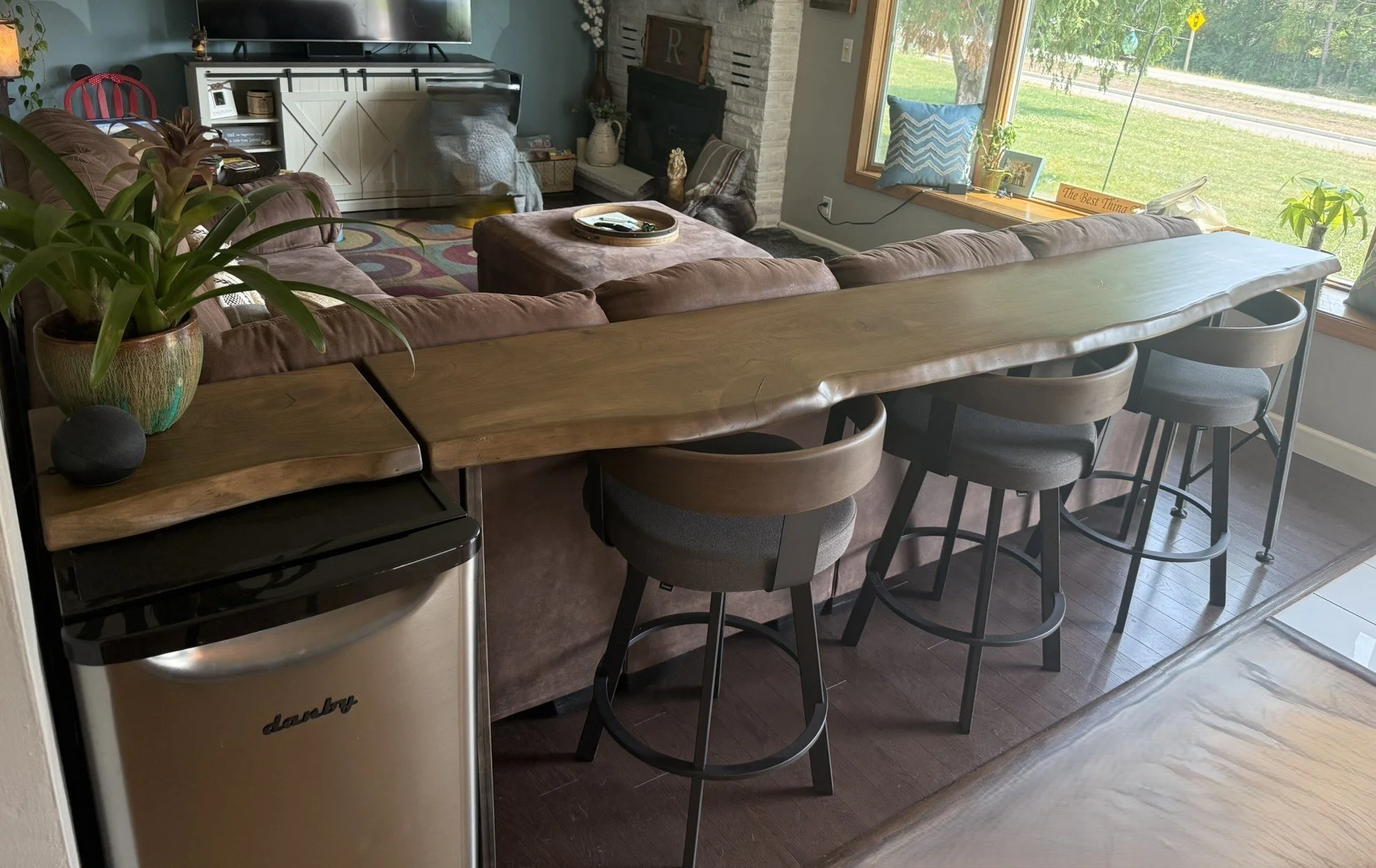 Rustic live edge black cherry console table with custom designed and built steel legs, and matching cutting board