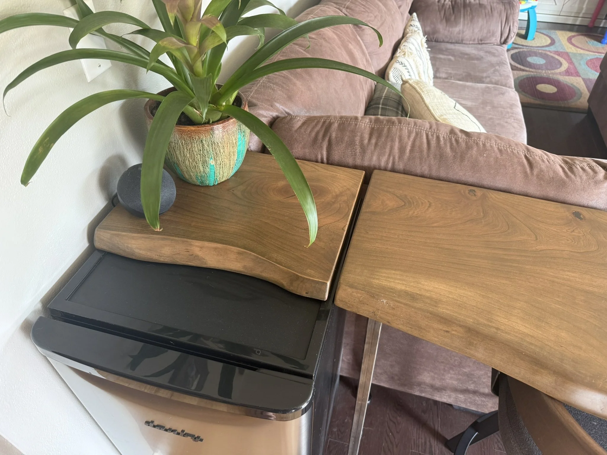 Rustic live edge black cherry console table with custom designed and built steel legs, and matching cutting board