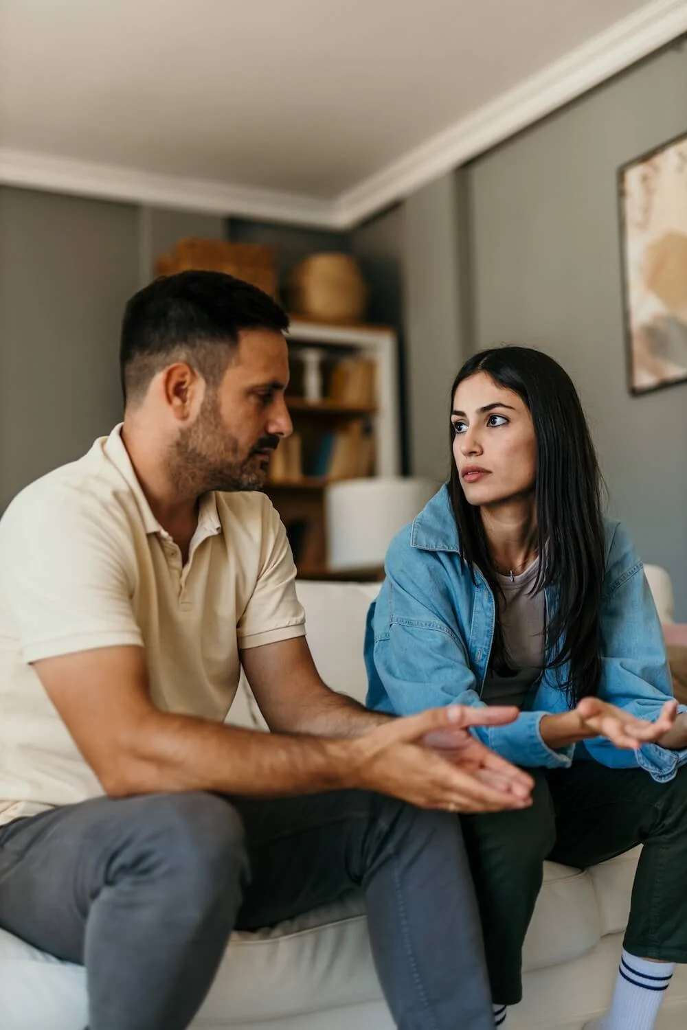 Couple having a serious conversation while working through relationship challenges