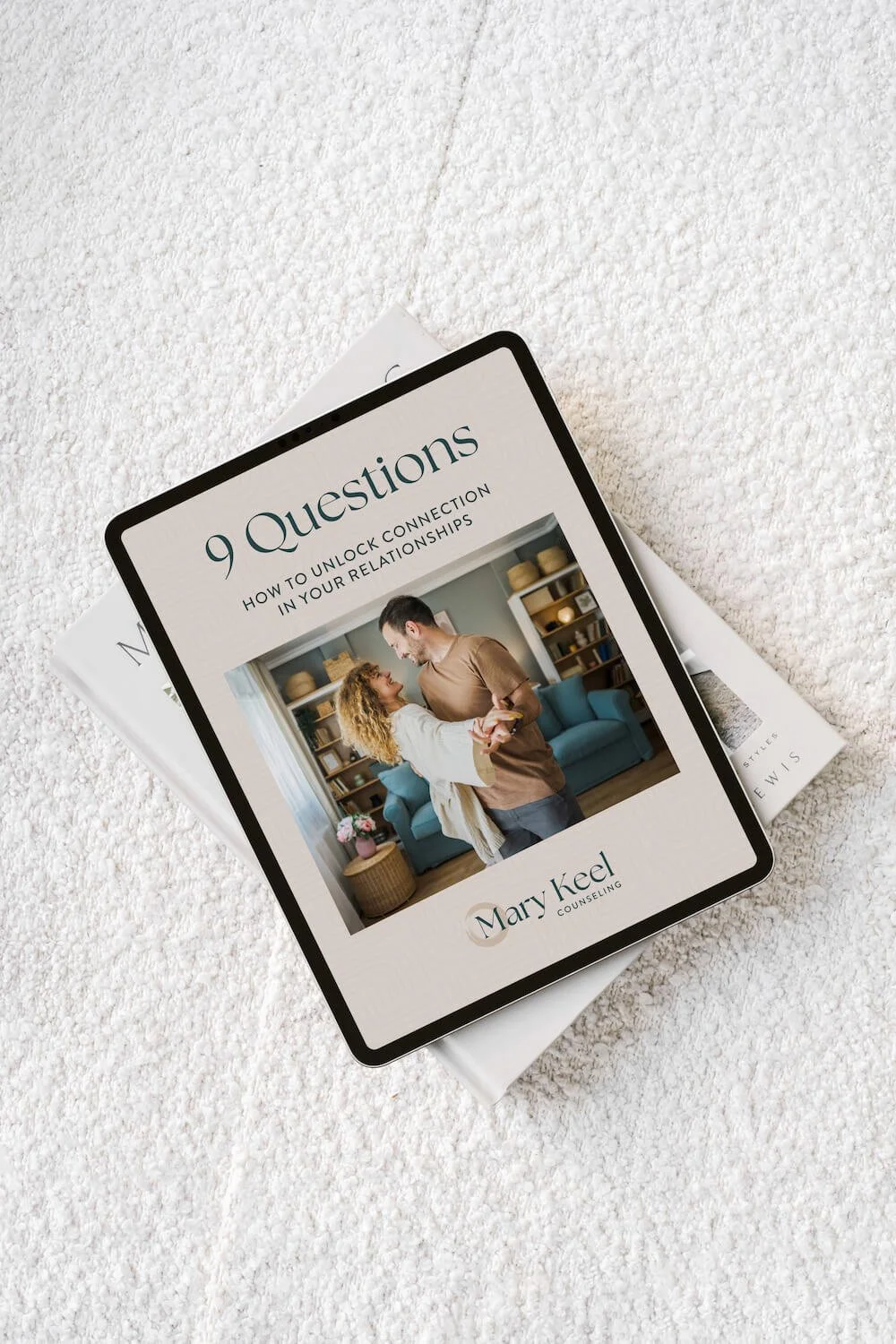 Tablet displaying relationship questions guide for improving communication and connection