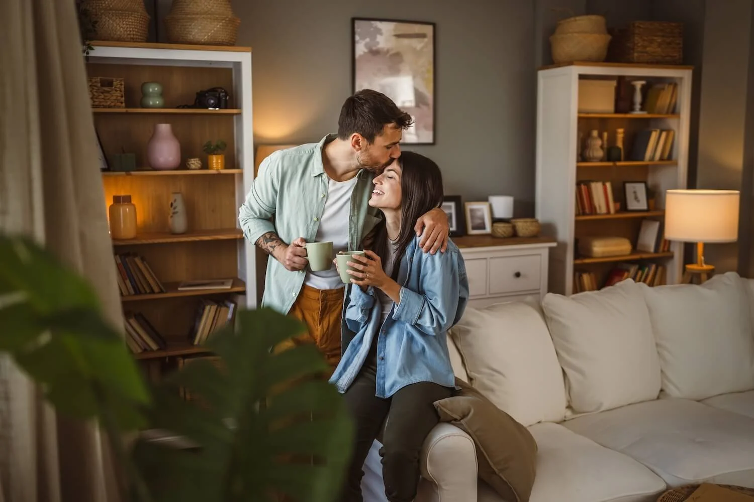 Couple sharing a warm, affectionate moment at home, representing emotional connection