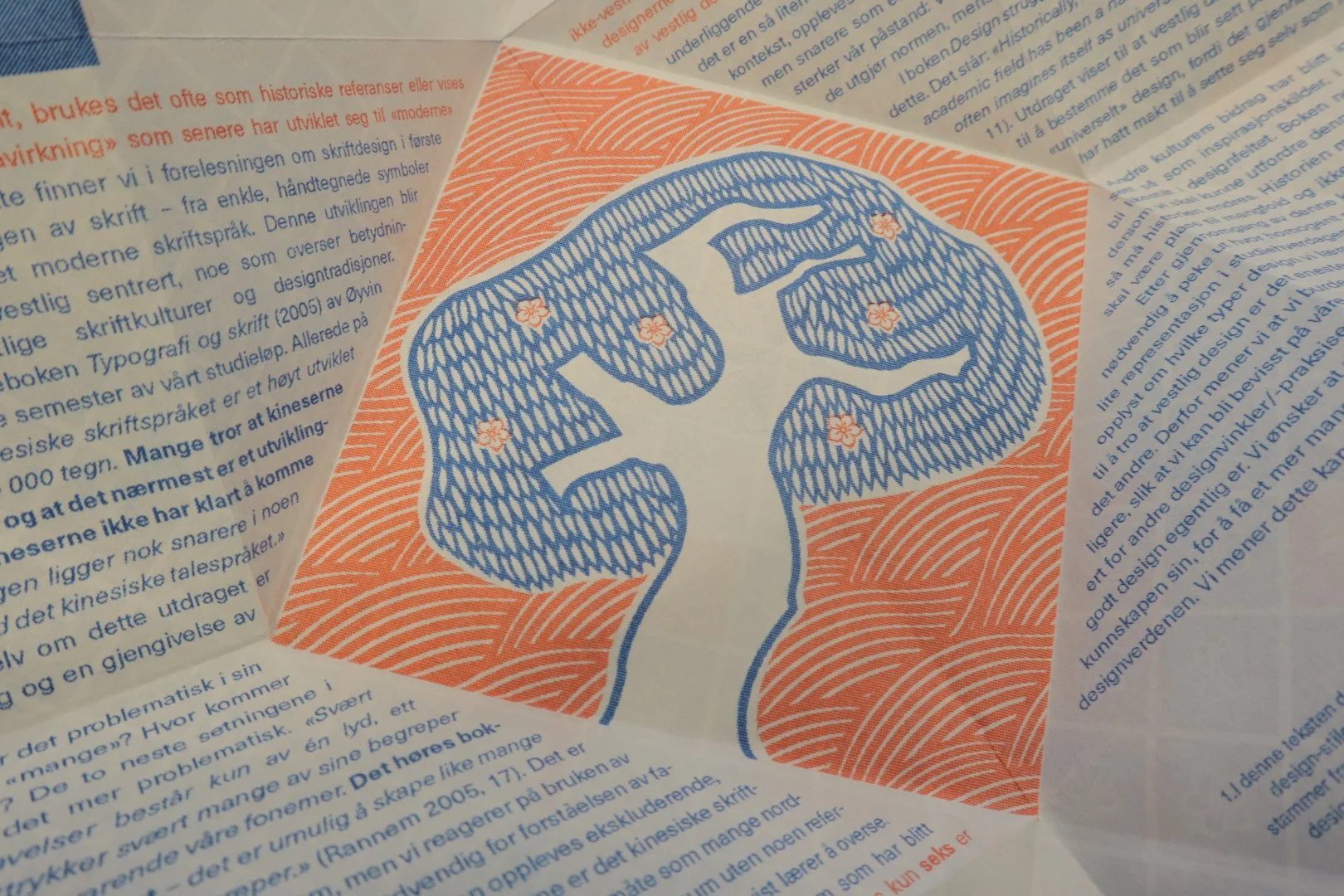 A riso printed page featuring a red background illustration of a blue tree with red lines behind.