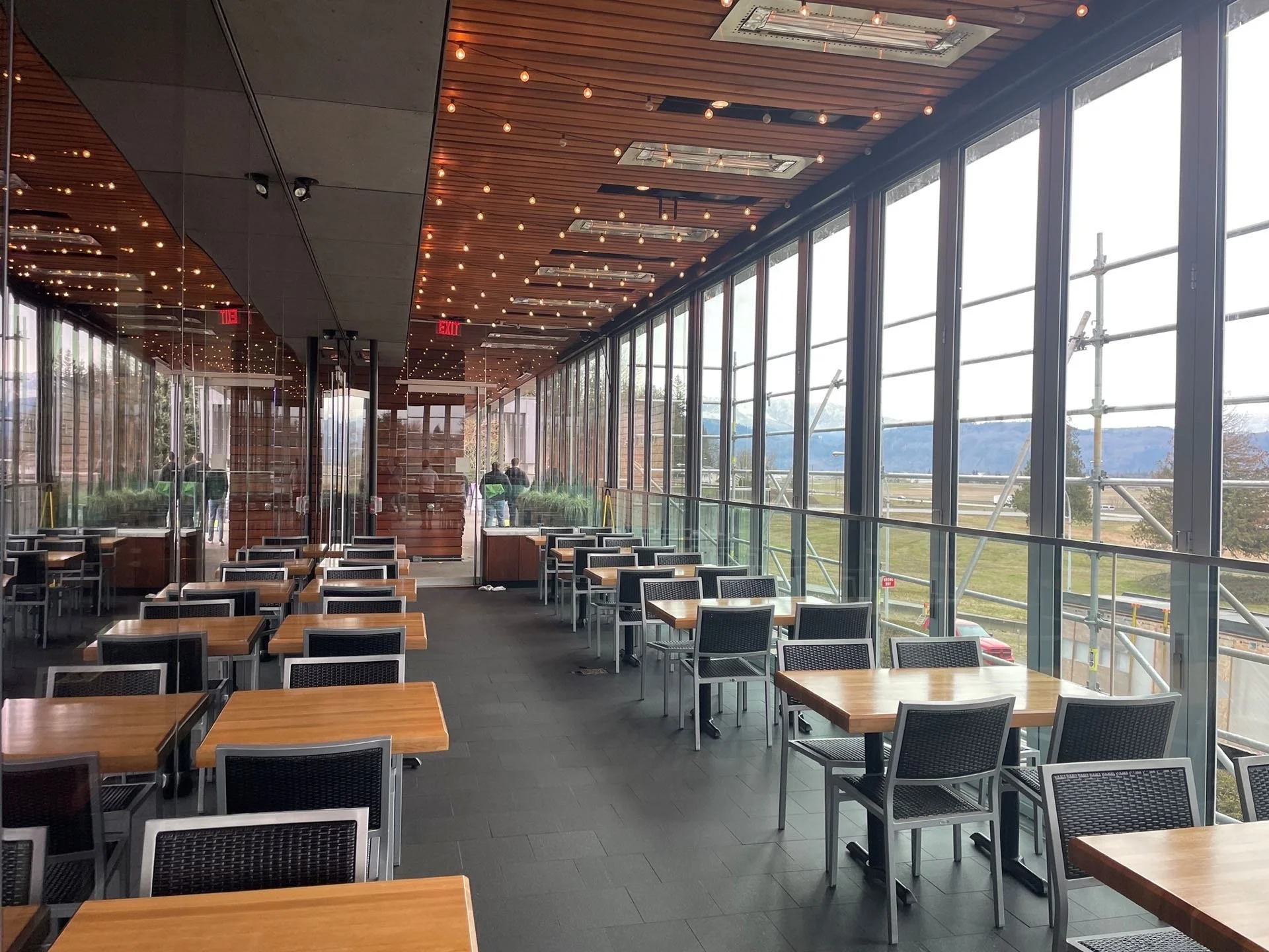 Commercial glazing project at Cactus Club with full-height windows and interior dining space
