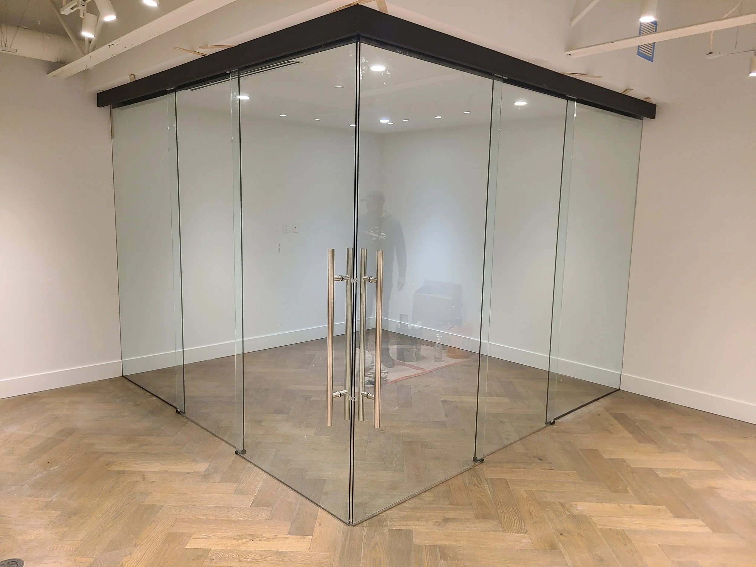 Interior glazing project at Matchpoint with glass office doors and partition wall