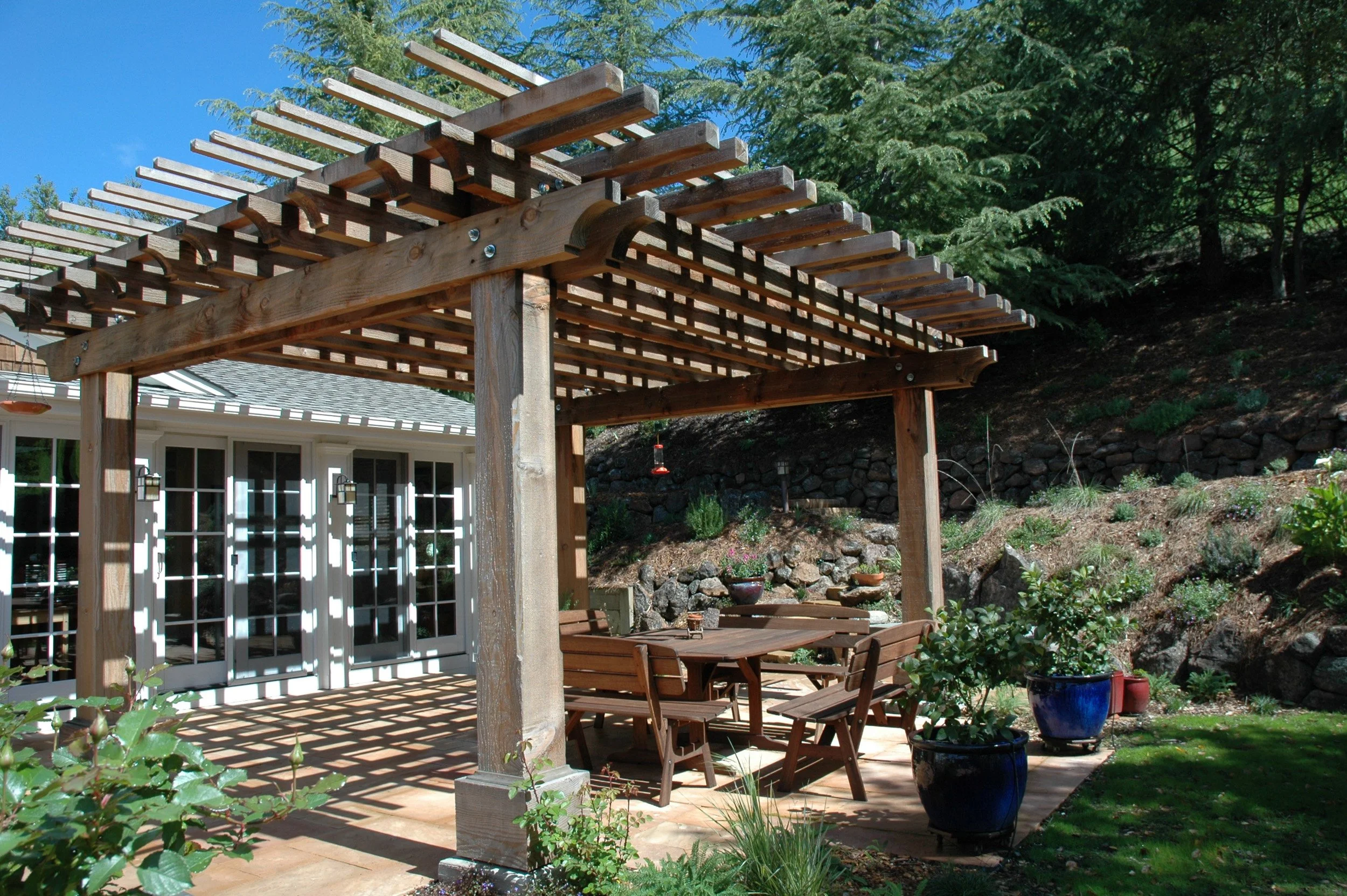 Overhead wood pergola arbor garden japanese style california native plant garden stone patio