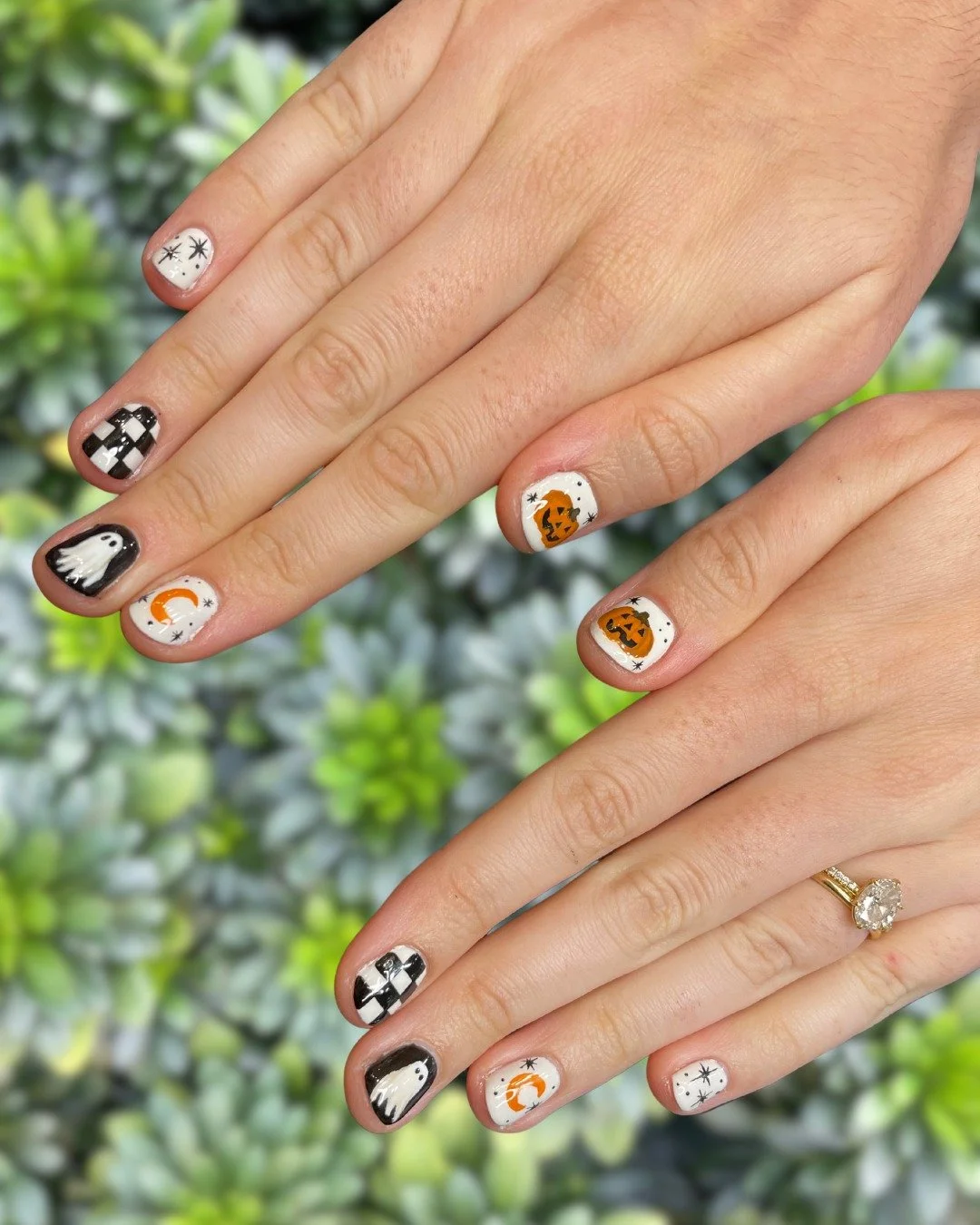 What's black and white and seasonally relevant? This haunted manicure! 

No minimum length is needed for any level of nail art, but some designs are exclusive to gel polish products. 🍁 More details on the Services page on the site in the Nails secti