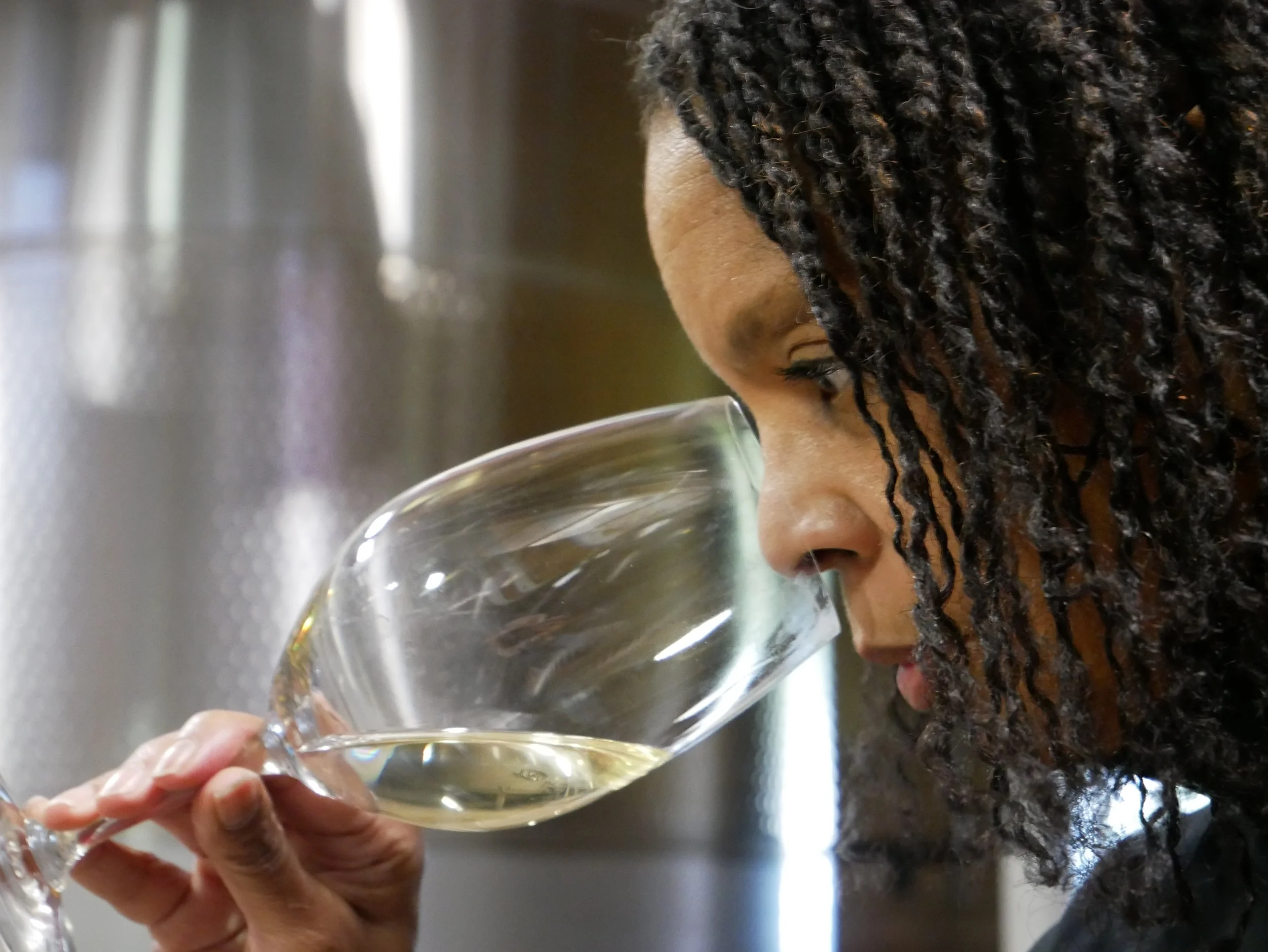 Tammee assessing aromas during blending trials