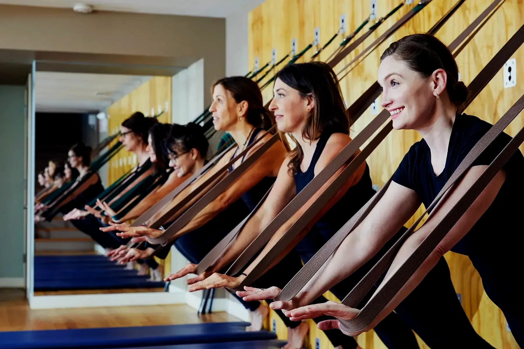 pilates-bucktown-chicago-women-strength-reformer.webp