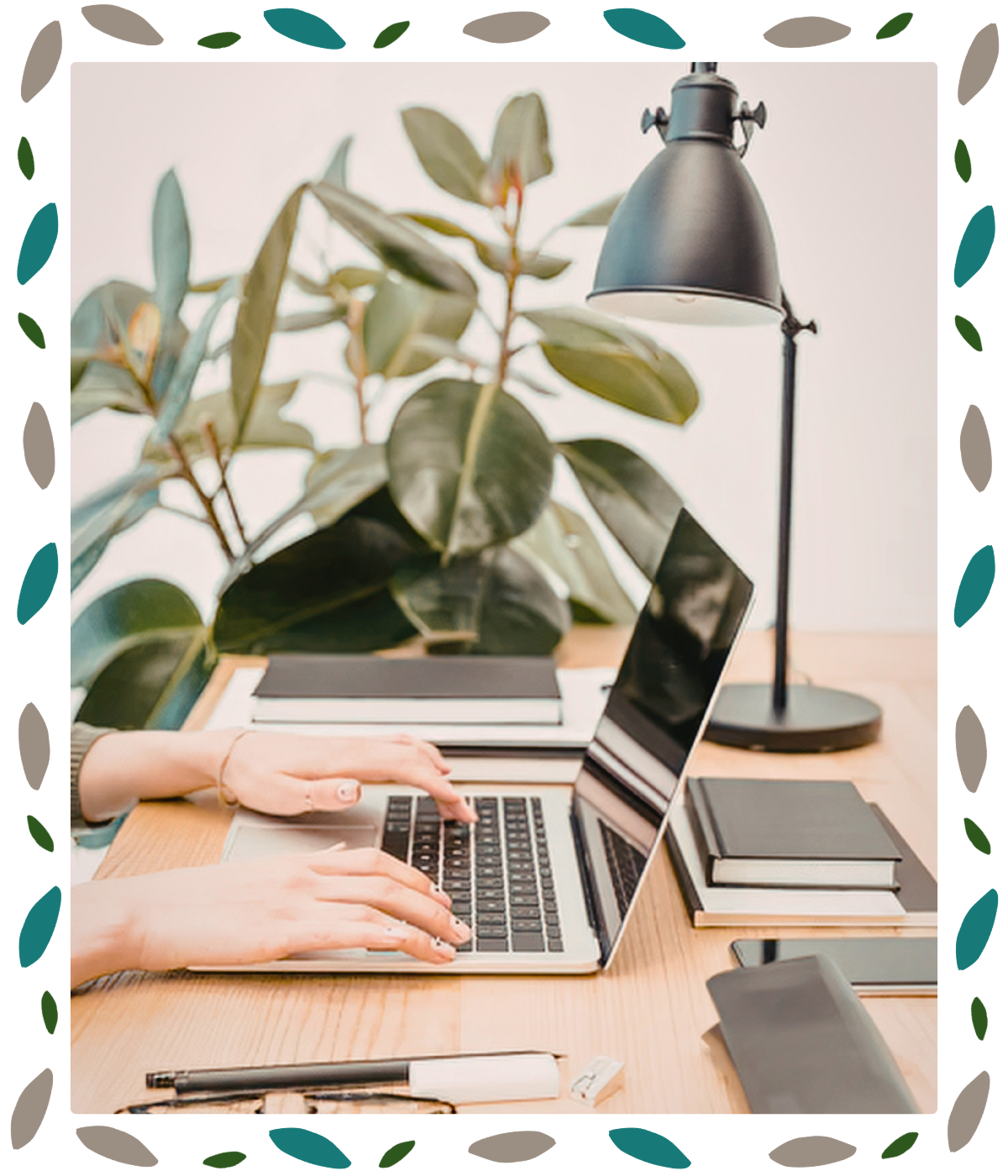 A laptop and plant on a tidy desk — representing the accessible, virtual practice of Matter Collaborative, offering therapy in North Carolina, career coaching, and organizational consulting for mission-driven professionals.