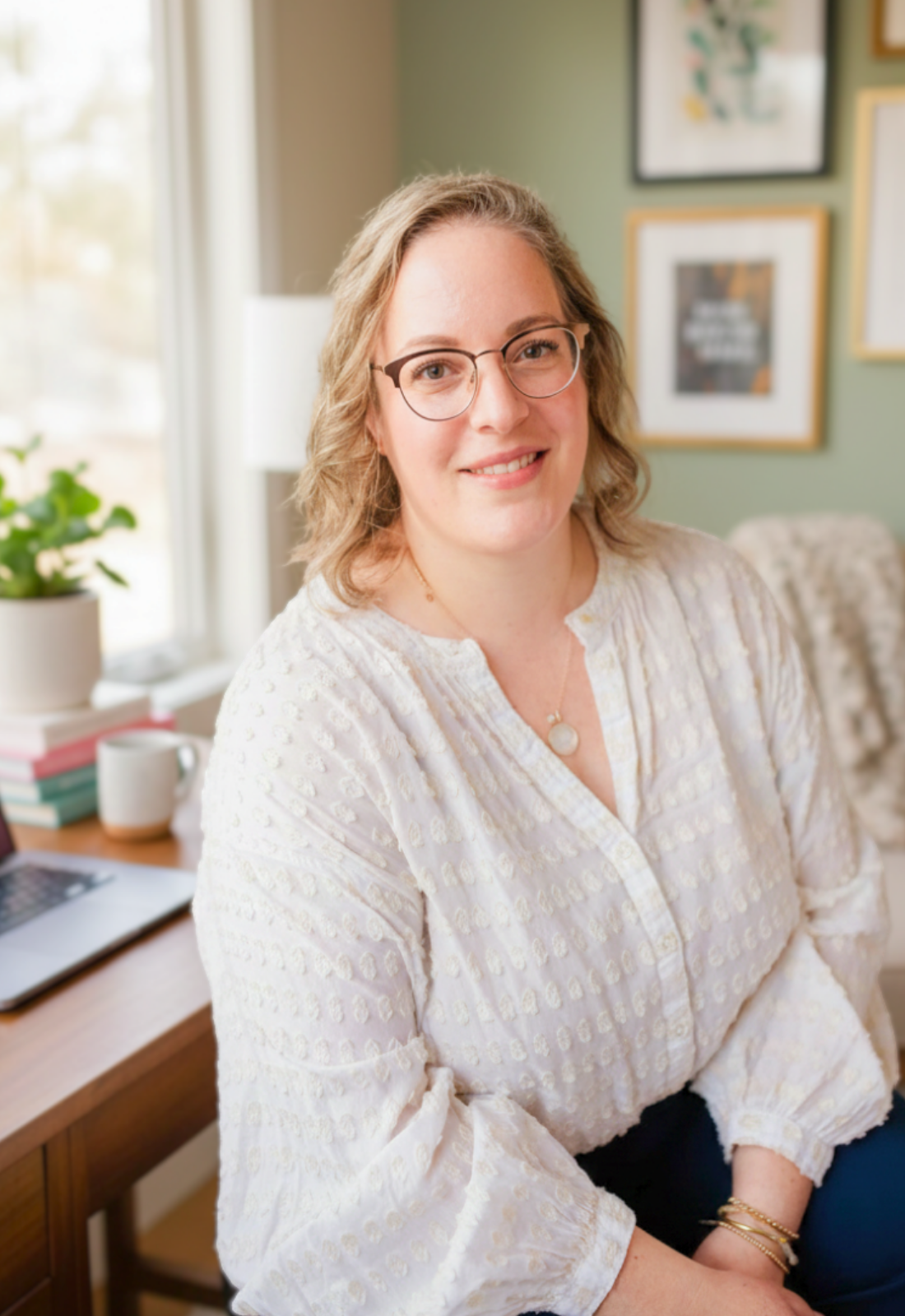 Mollie Stephens, founder of Matter Collaborative, smiling warmly in a bright home office — representing the approachable, direct consulting partnership she brings to mission-driven nonprofits and social impact organizations.