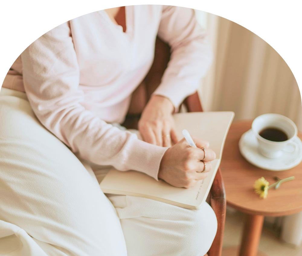 A person sits at ease with a warm drink — representing the grounded, goal-oriented approach of career coaching for mission-driven leaders navigating imposter syndrome, career pivots, and leadership transitions.