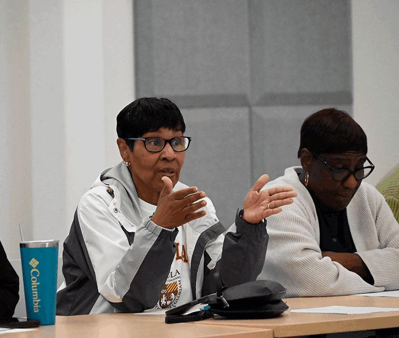 ladies talking during a meeting