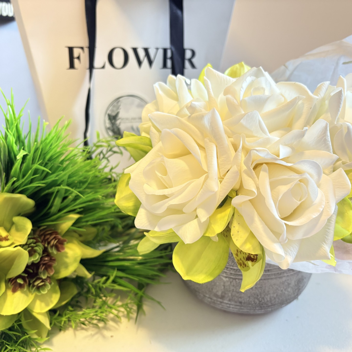 Roses in a vase.png