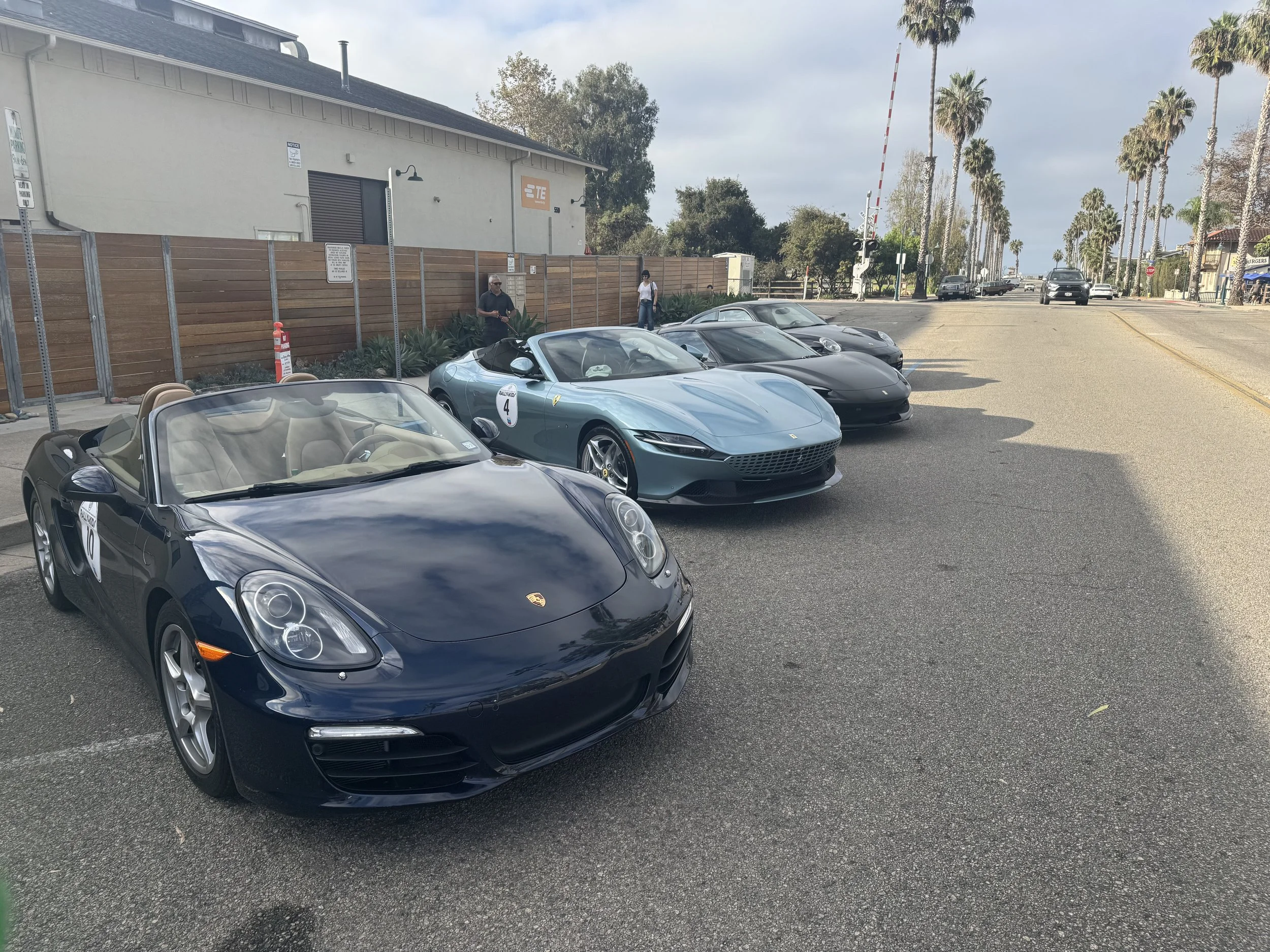 four-convertibles-parked-on-street-with-palm-trees--386d5ed3.jpeg