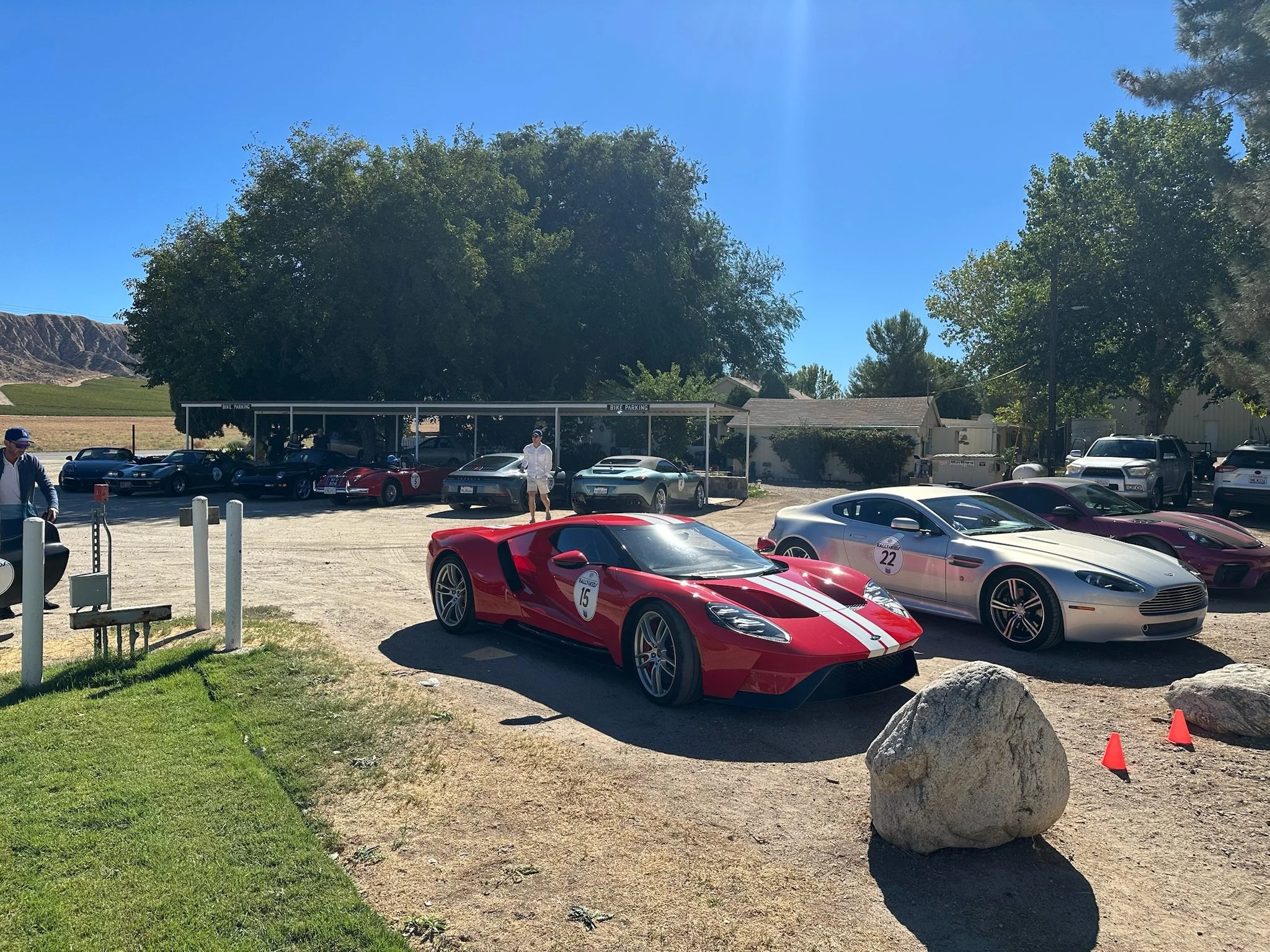 red-race-car-number-15-parked-next-to-silver-car-number-22--8e50fb0d.jpeg