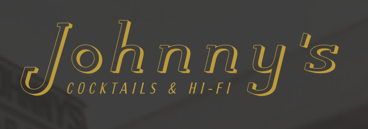 Sign for Johnny's Cocktails & Hi-Fi bar, with yellow lettering on a dark background.