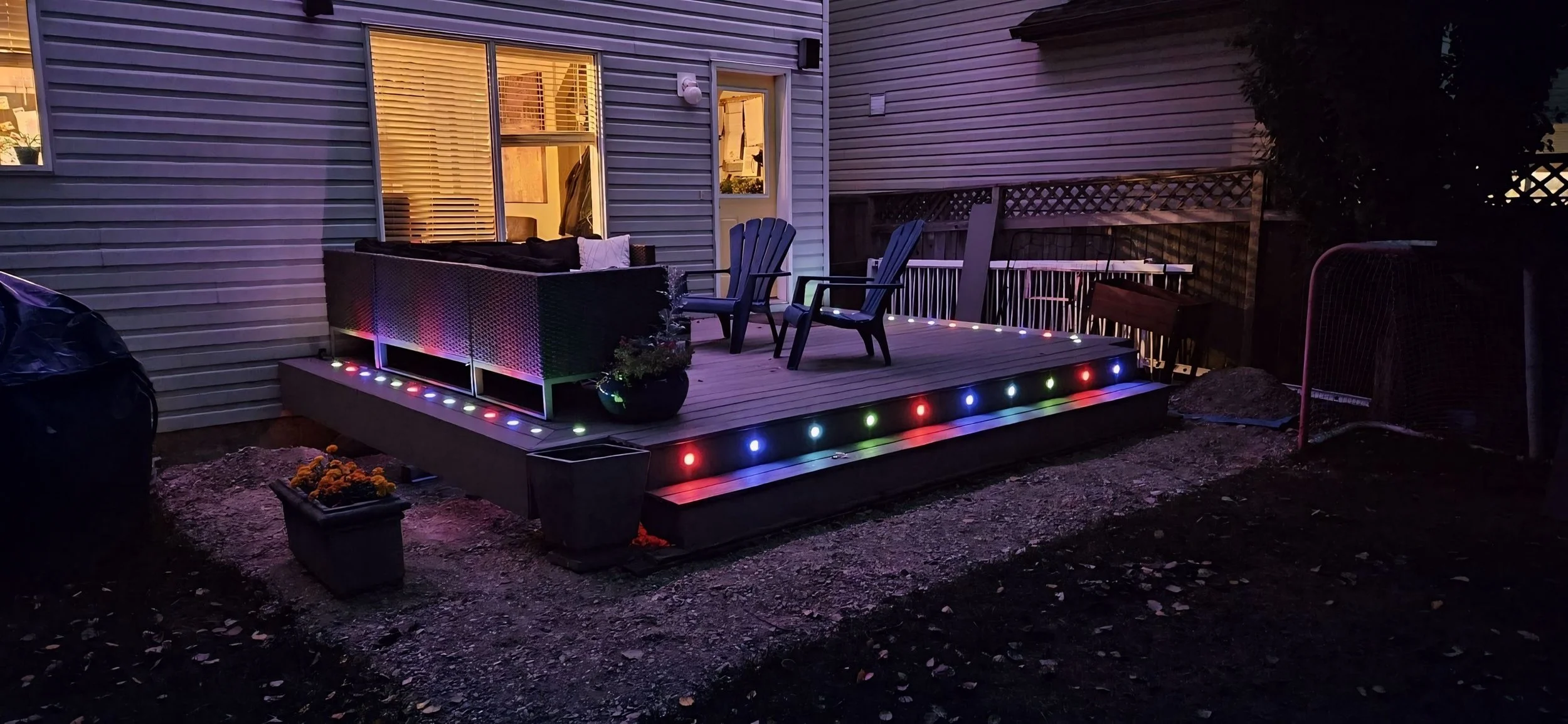 Permanent lighting, JellyFish and WATTS , illuminated by LED lighting along the edges of the roof, soffits and walls in the Denver Colorado area