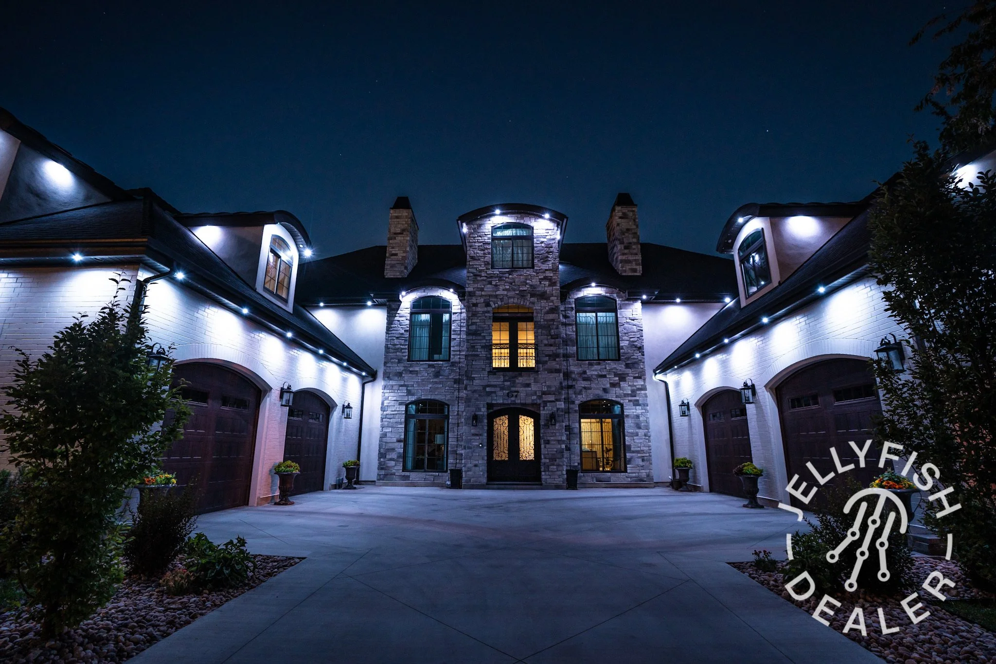 Permanent lighting, JellyFish and WATTS , illuminated by LED lighting along the edges of the roof, soffits and walls in the Denver Colorado area