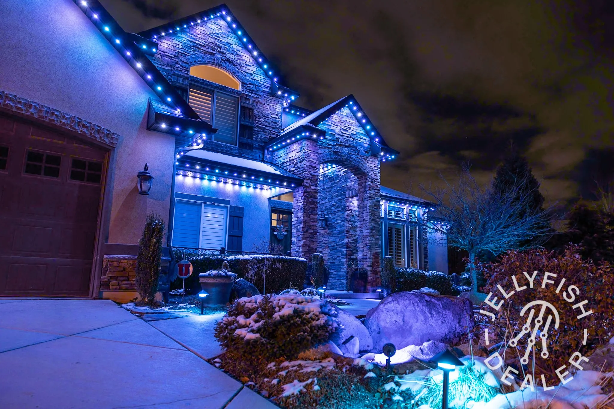 Permanent lighting, JellyFish and WATTS , illuminated by LED lighting along the edges of the roof, soffits and walls in the Denver Colorado area